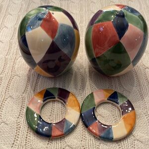 New ceramic glazed salt & pepper shakers with 2 napkins rings. Rubber stoppers